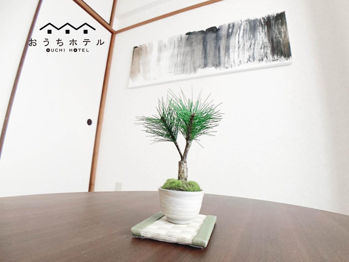 Ouchi Hotel Dambara Hiroshima Esterno foto
