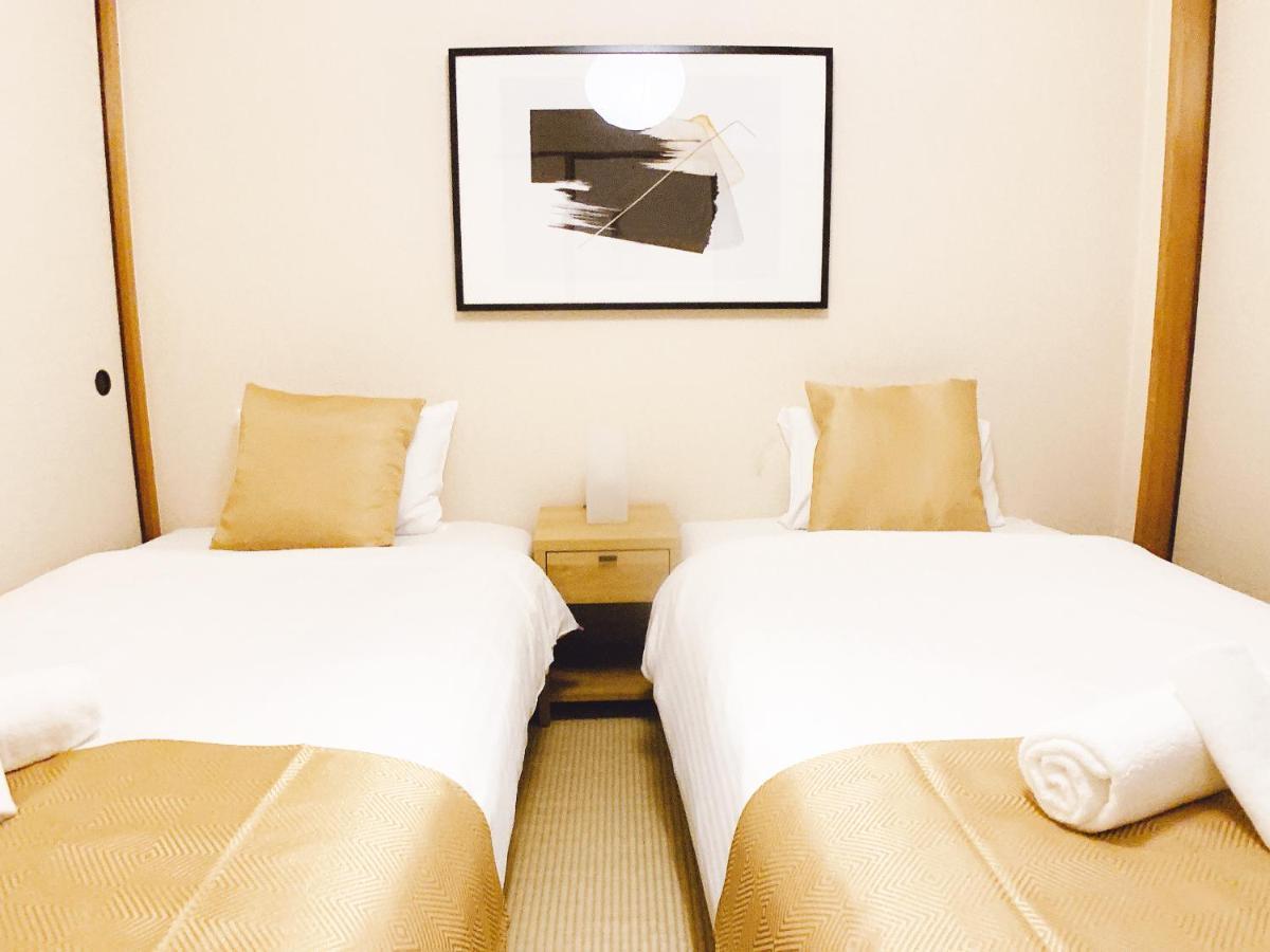 Ouchi Hotel Dambara Hiroshima Esterno foto